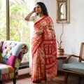 Red Mul Cotton Hand Batik Print Saree, draped and worn by a woman, AI visual of the saree, iTokri