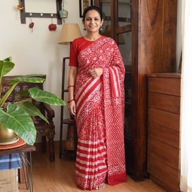 Pink Mul Cotton Hand Batik Print Saree, draped and worn by a woman, AI visual of the saree, iTokri