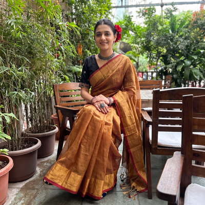 Brown Mul Tissue Zari Bengal Saree with Embroidered Blouse, draped and worn by a woman, AI visual of the saree, iTokri