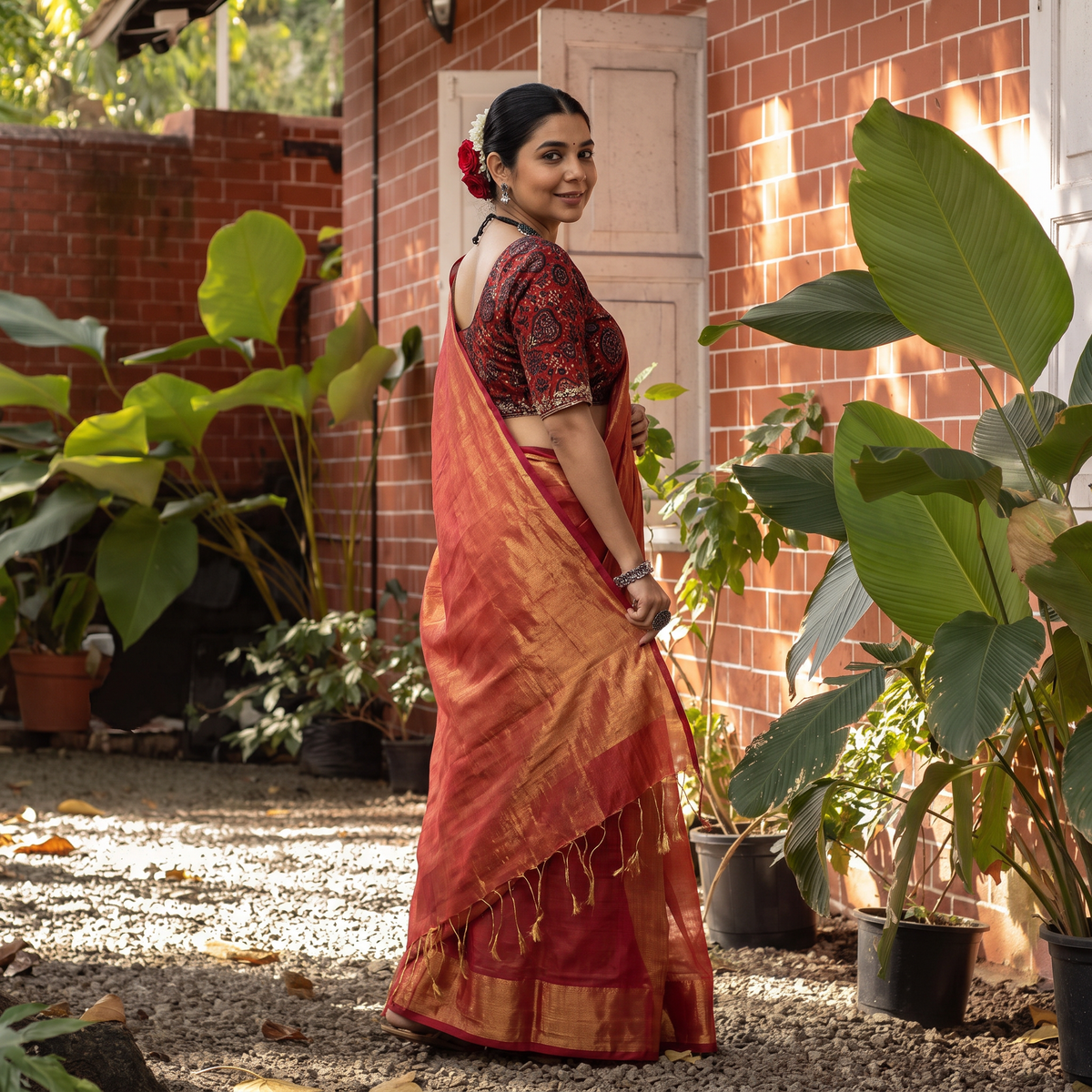 Red Mul Tissue Zari Bengal Saree with Embroidered Blouse, draped and worn by a woman, AI visual of the saree, iTokri