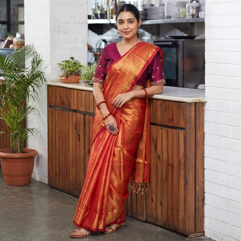 Orange Mul Tissue Zari Bengal Saree with Embroidered Blouse, draped and worn by a woman, AI visual of the saree, iTokri