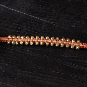 Handcrafted tribal dokra brass thread rakhi 15