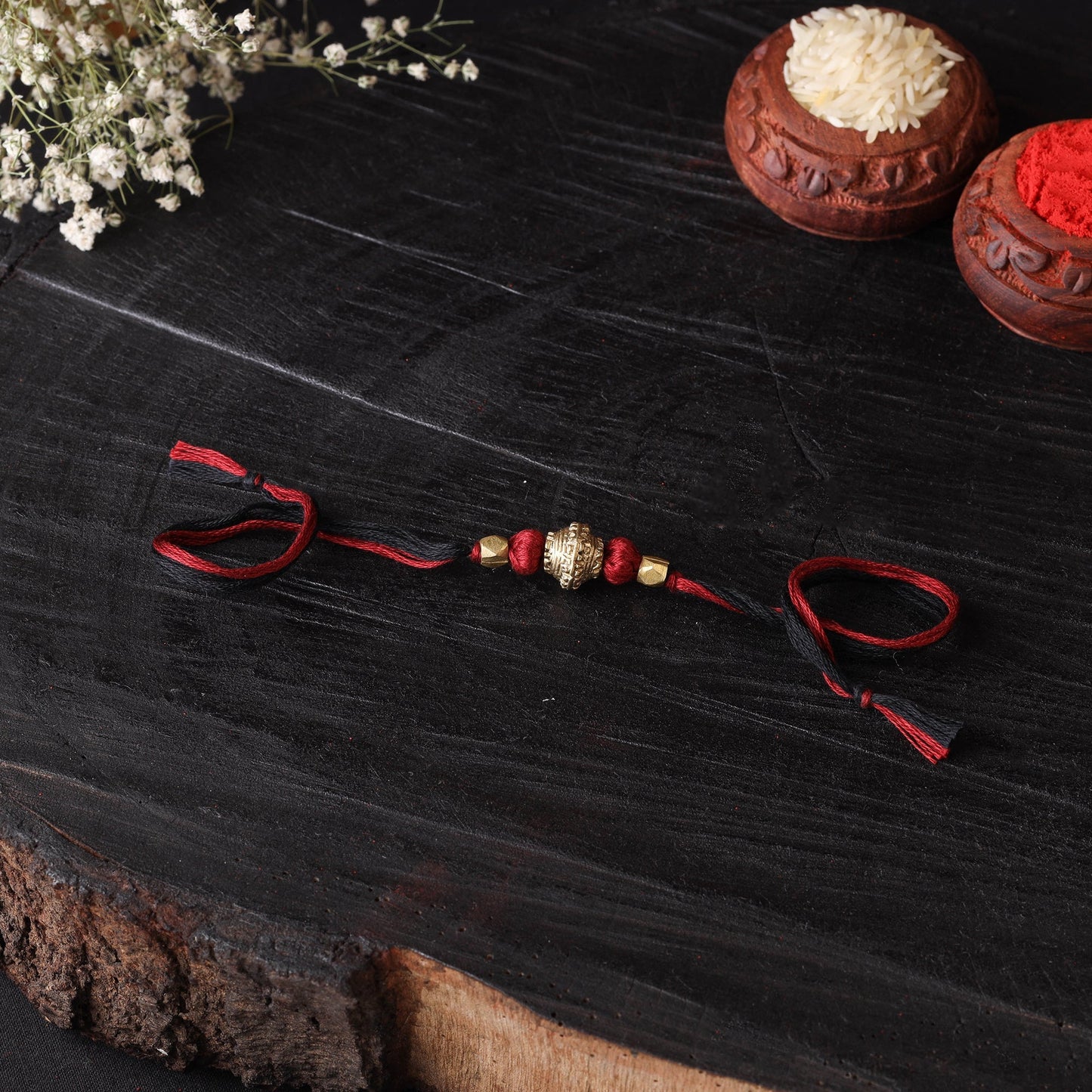 Handcrafted tribal dokra brass thread rakhi 19
