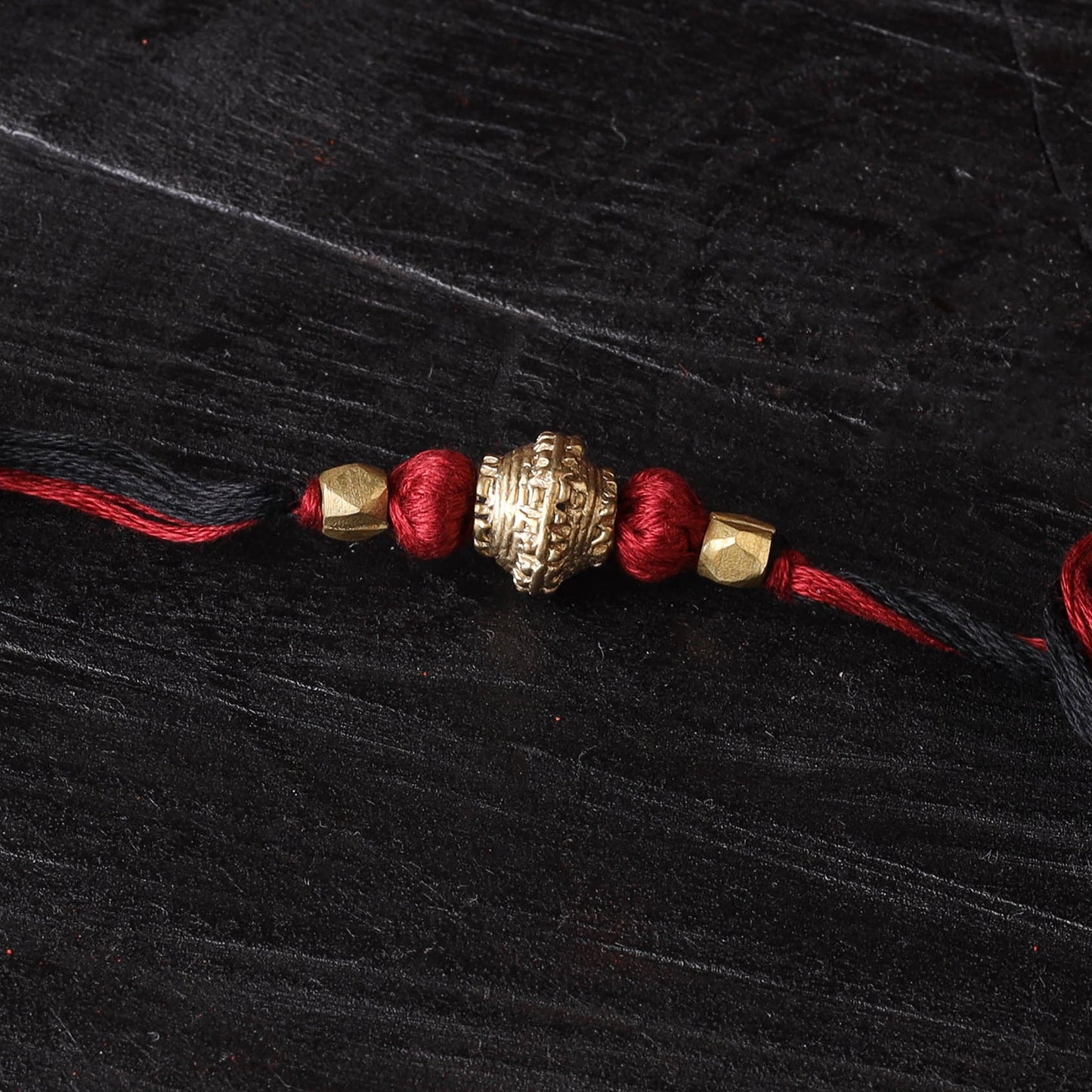 Handcrafted tribal dokra brass thread rakhi 19
