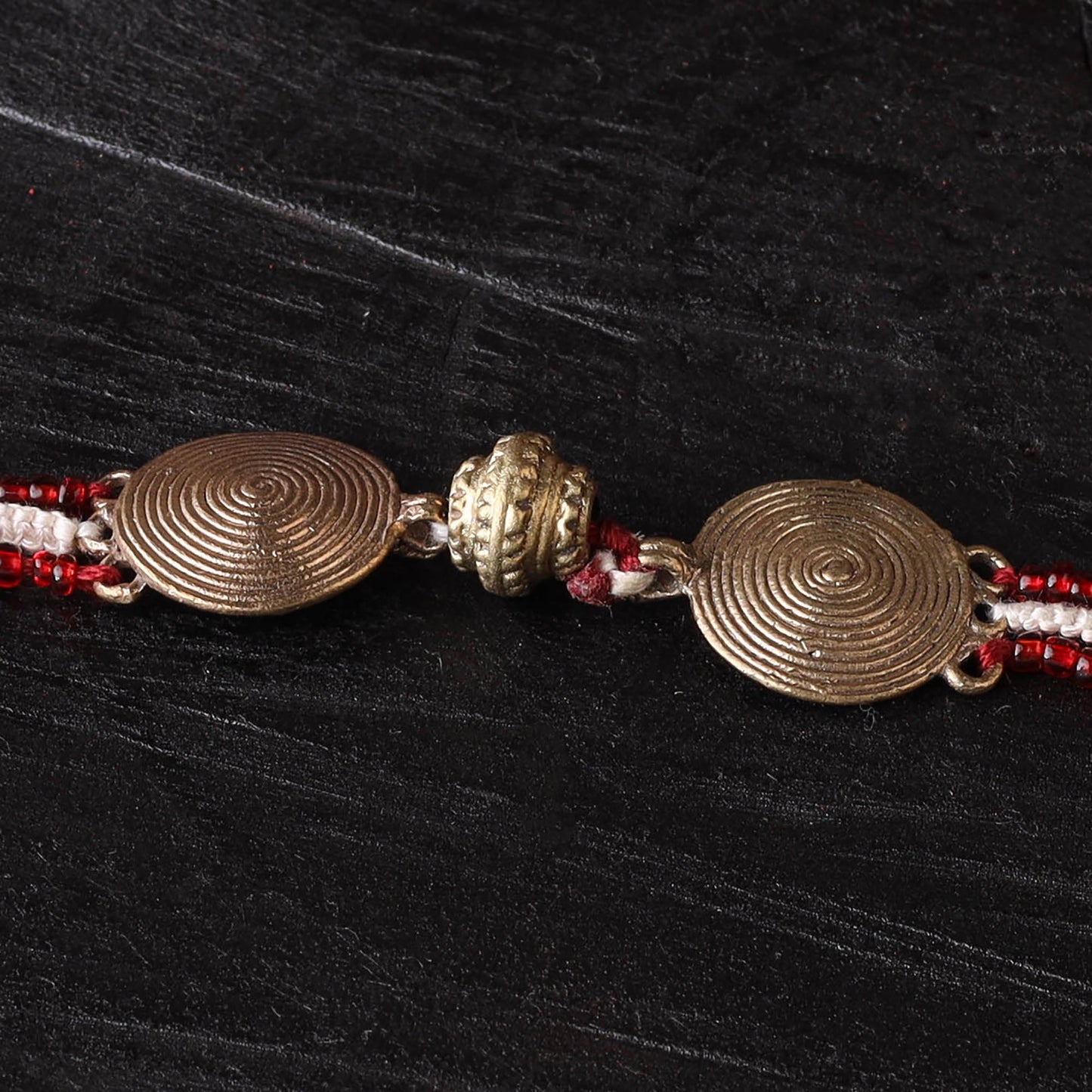 Handcrafted tribal dokra brass thread rakhi 34