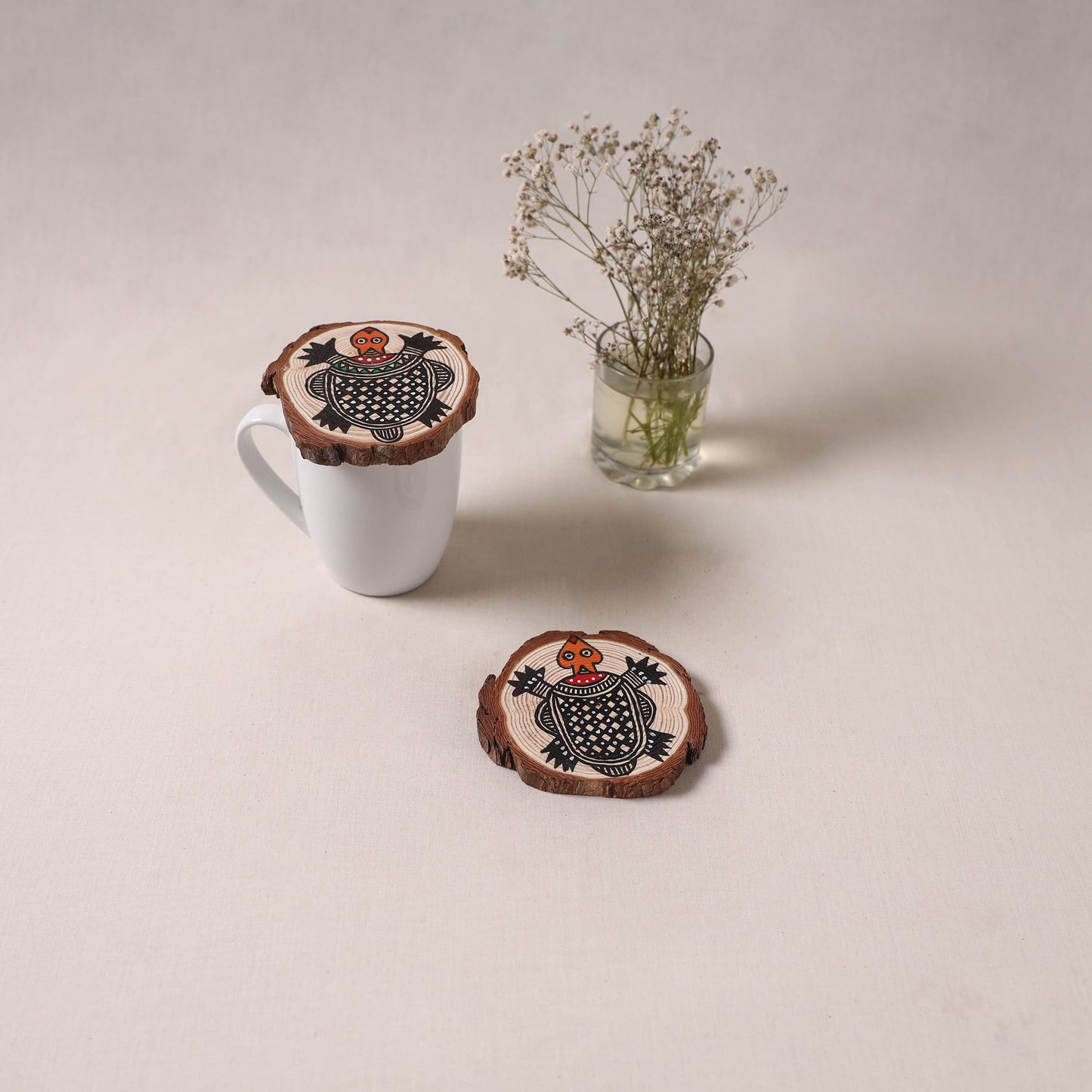 Madhubani handpainted pine wood coaster (set of 2) 13