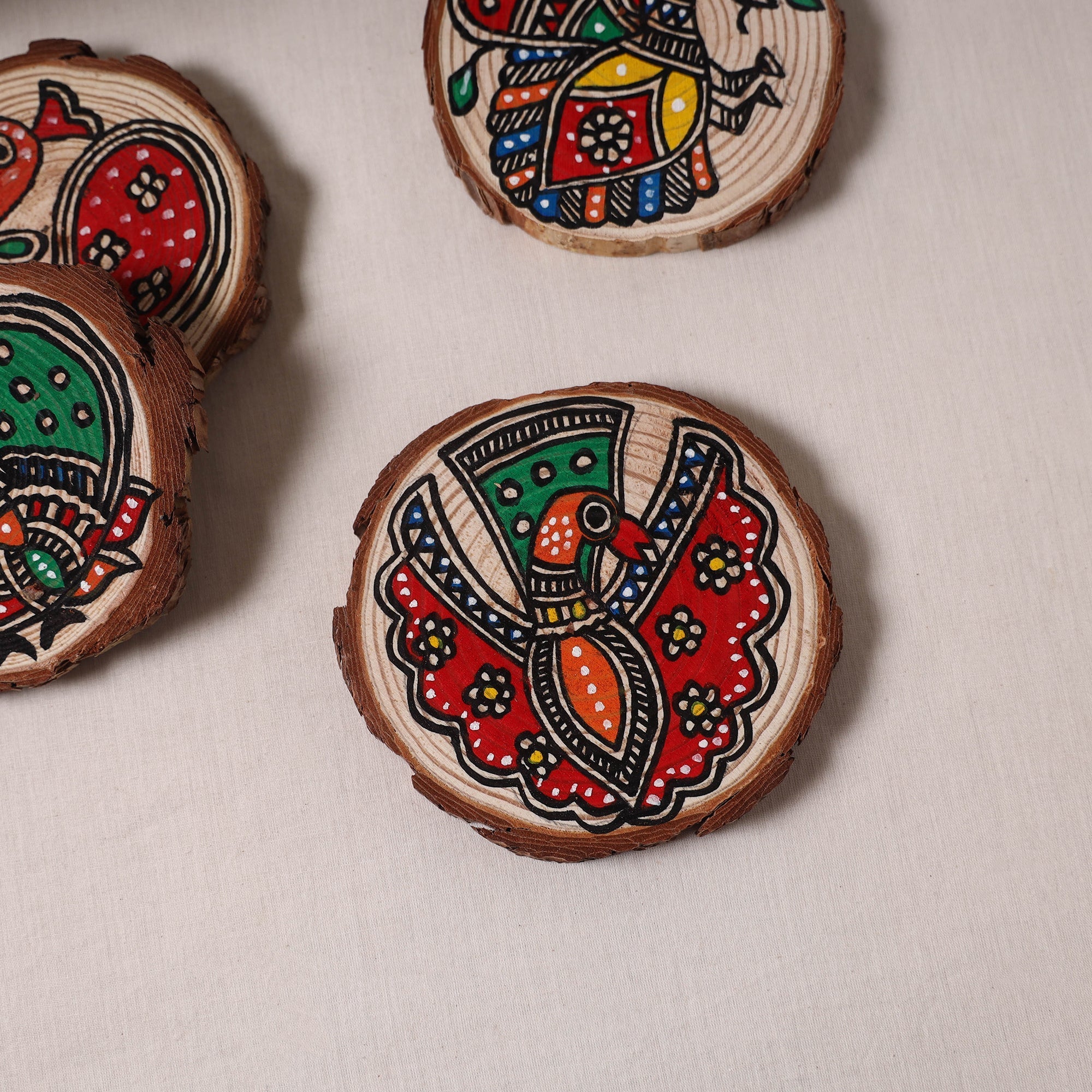 Madhubani handpainted pine wood coaster (set of 4) 01