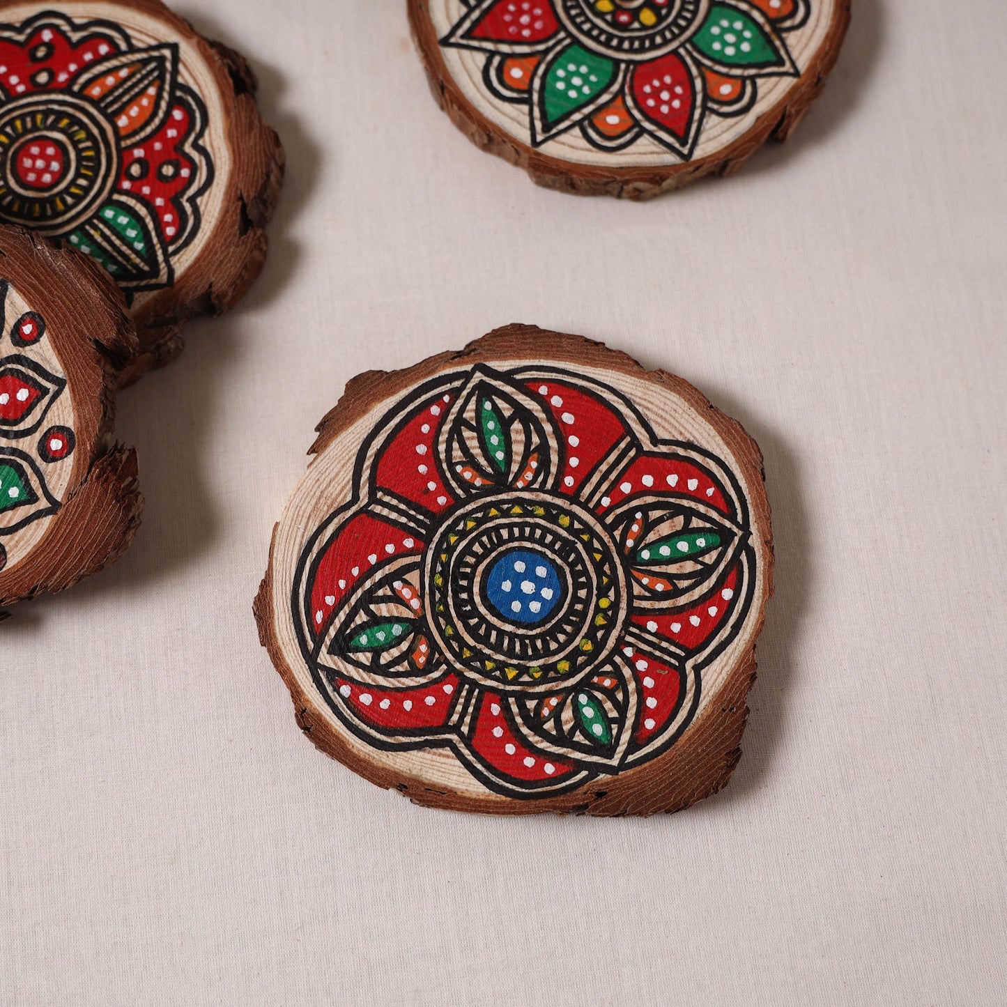 Madhubani handpainted pine wood coaster (set of 4) 06