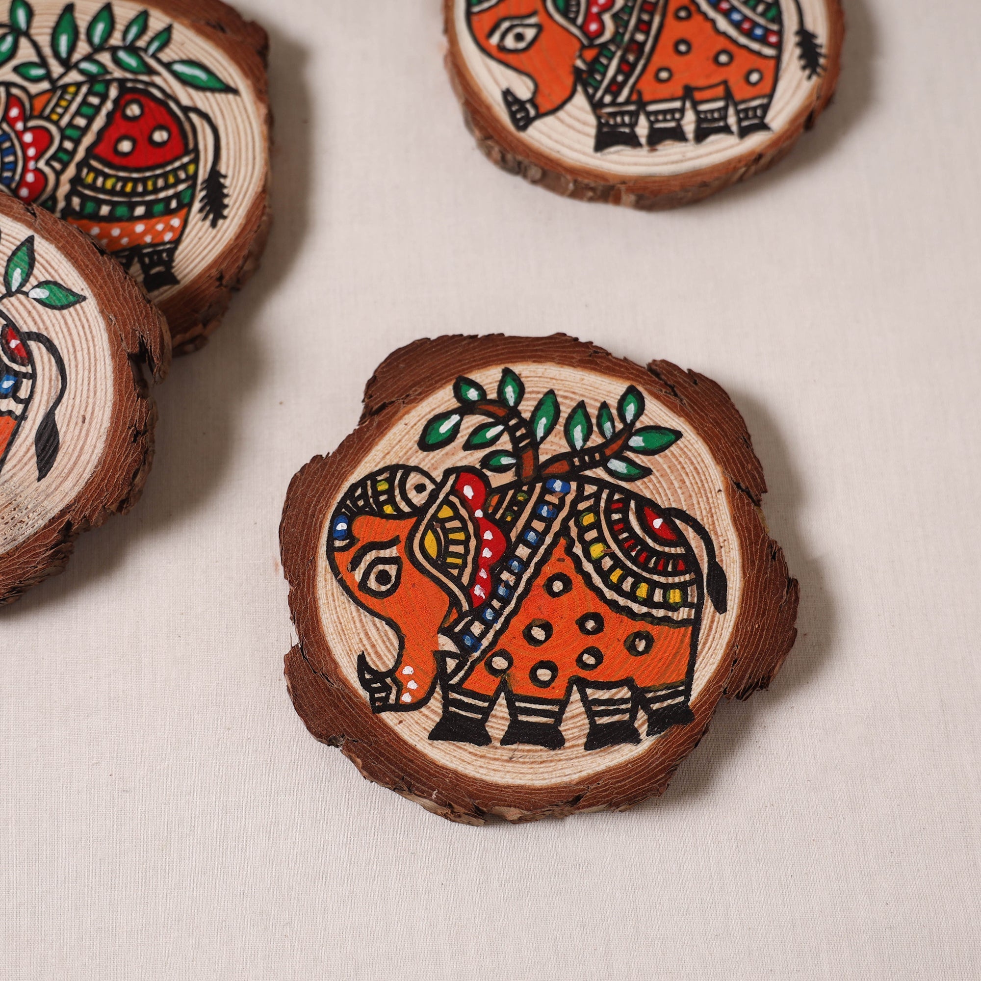 Madhubani handpainted pine wood coaster (set of 4) 07