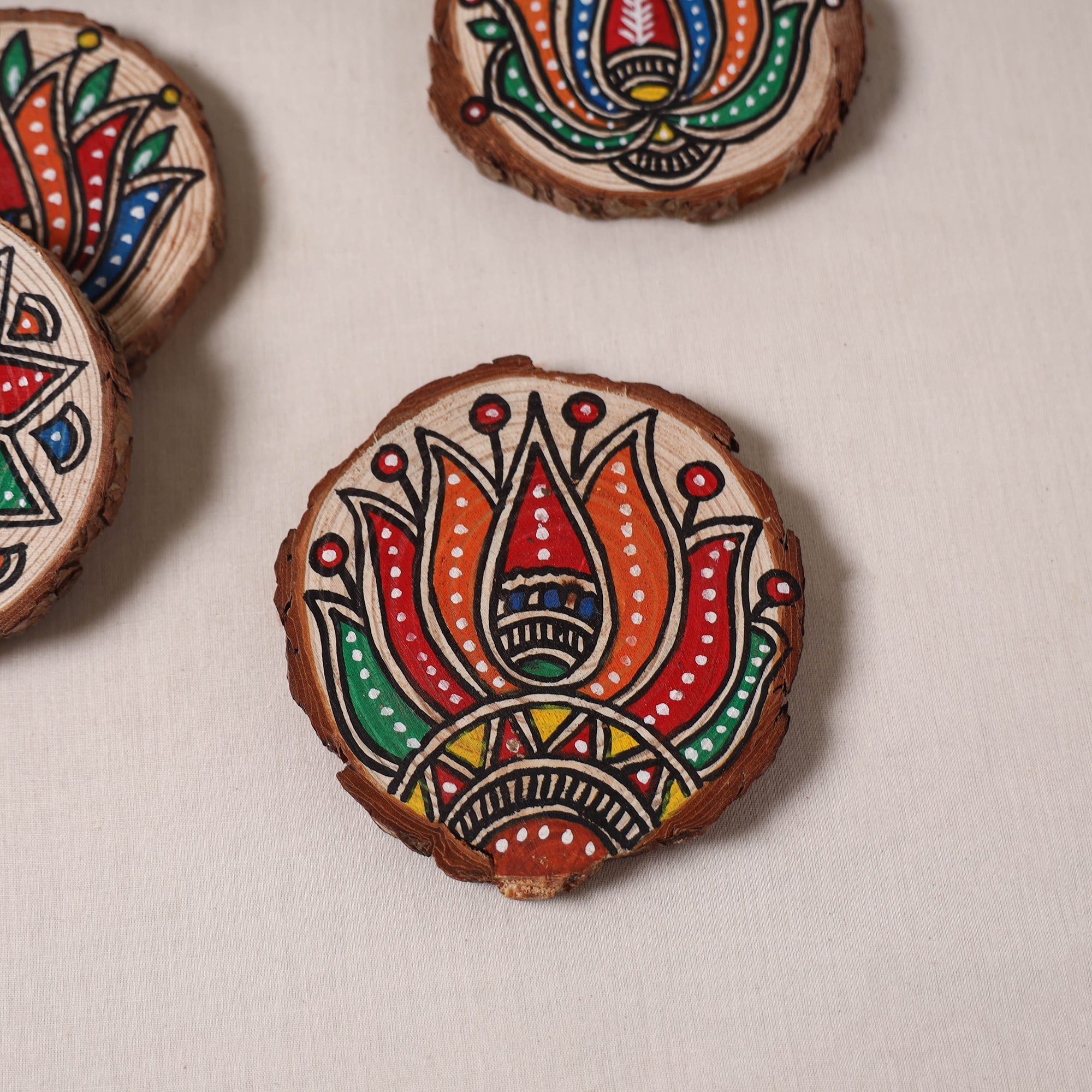 Madhubani handpainted pine wood coaster (set of 4) 08