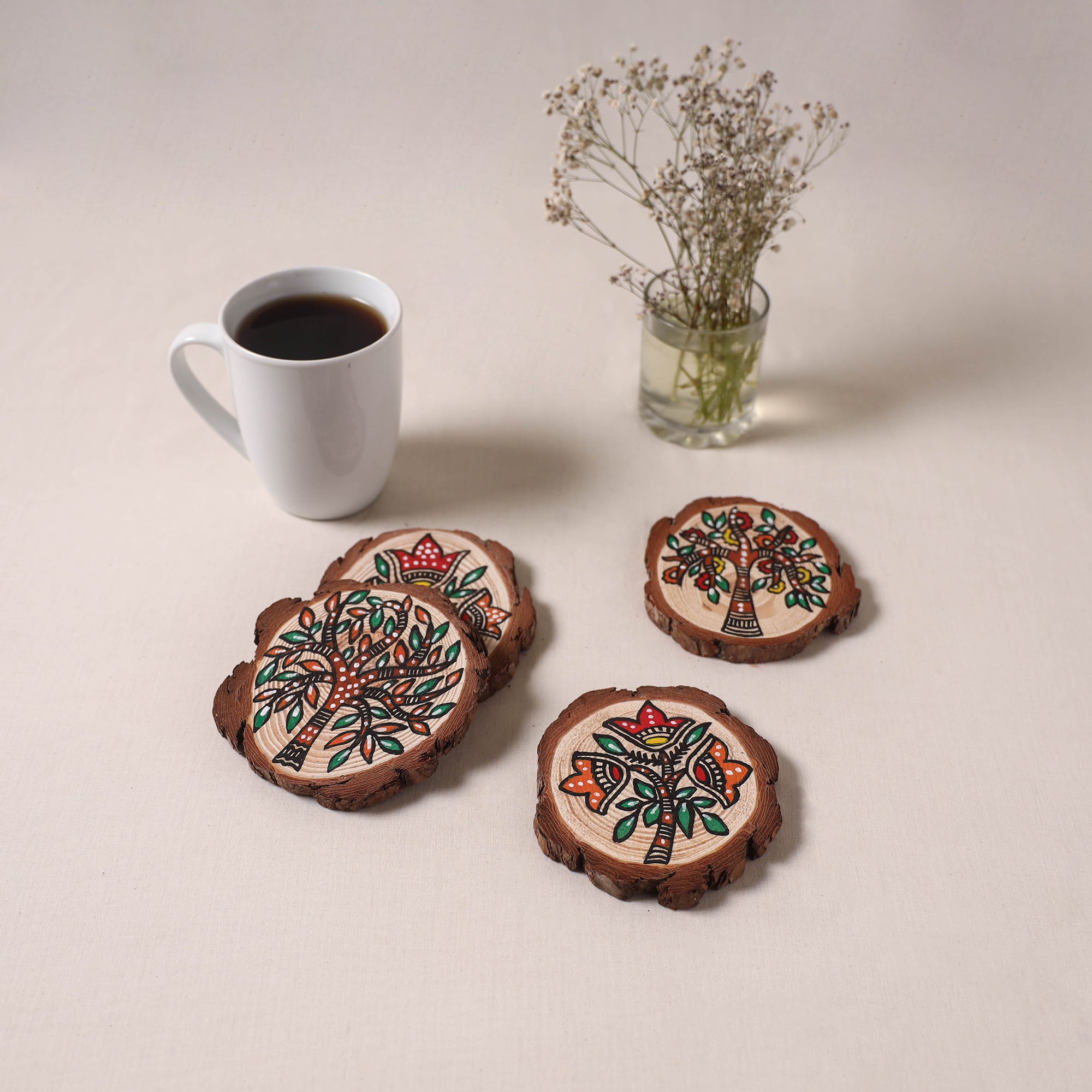 Madhubani handpainted pine wood coaster (set of 4) 09