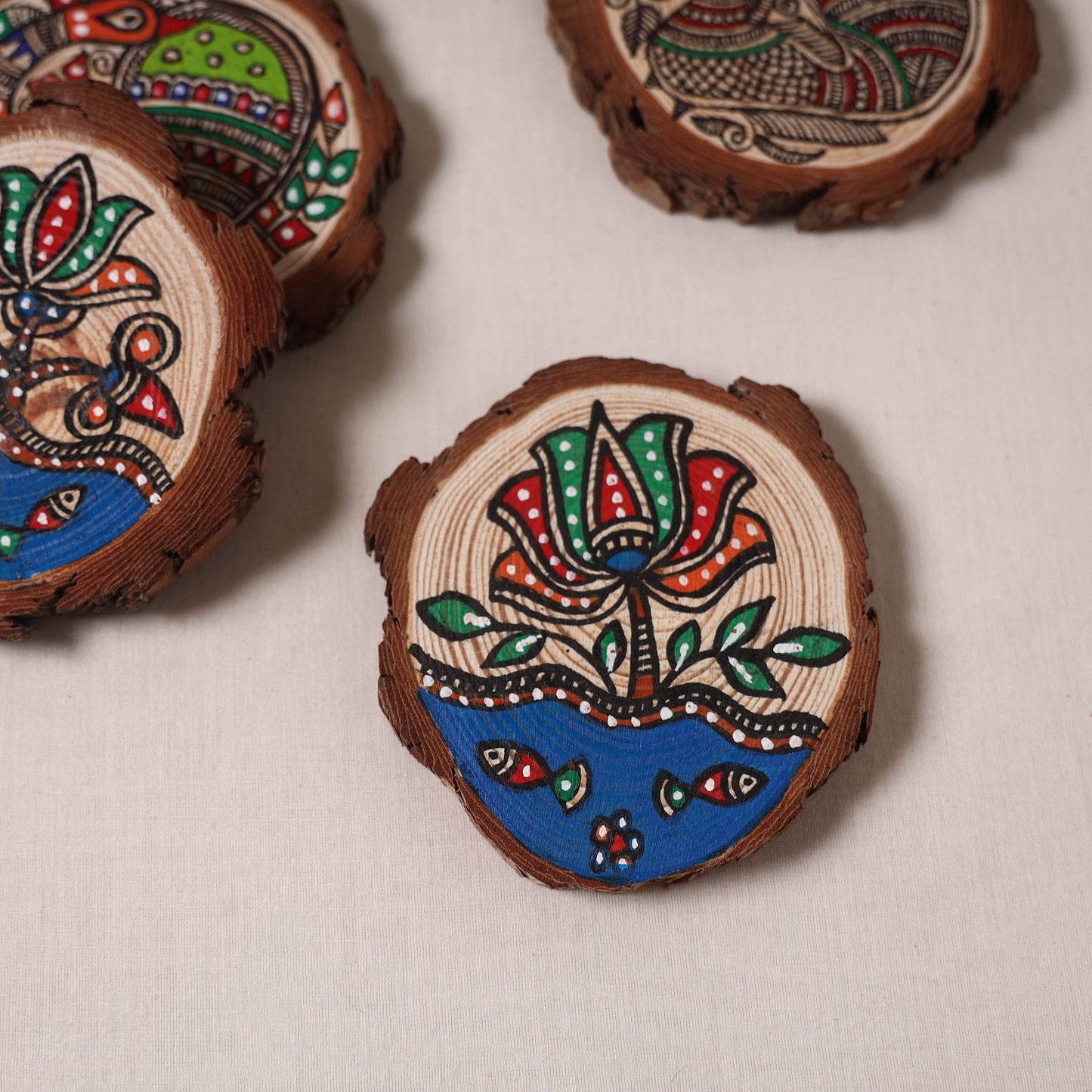 Madhubani handpainted pine wood coaster (set of 4) 11