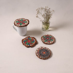 Madhubani handpainted pine wood coaster (set of 4) 12