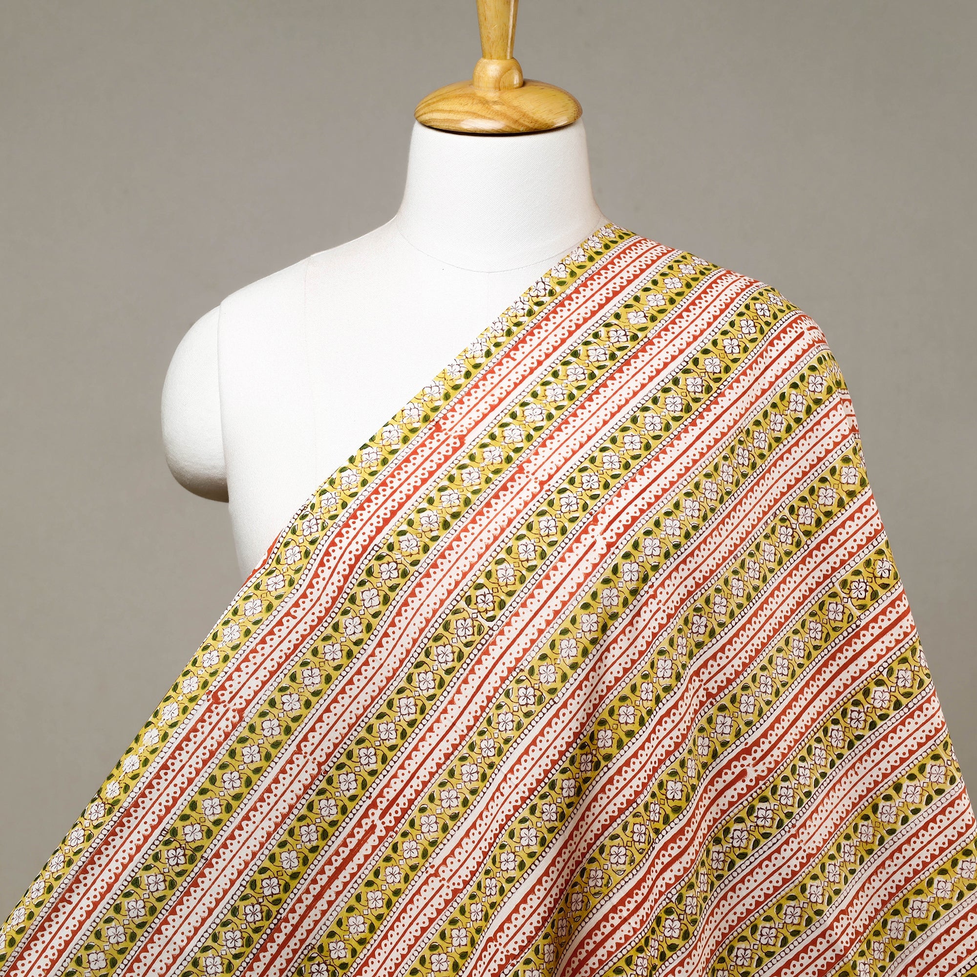 Buy White Floral Buds Yellow Border Sanganeri Block Printed Cotton Fabric Online at iTokri.com