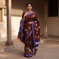 Maroon Nath Work Silk Cotton Khun Saree, draped and worn by a woman, AI visual of the saree, iTokri
