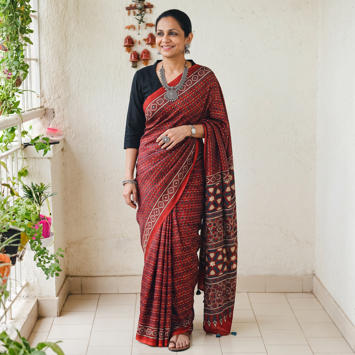 Red Natural Dyed Block Print Modal Silk Ajrakh Saree, draped and worn by a woman, AI visual of the saree, iTokri