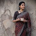 Red Natural Dyed Block Print Silk Ajrakh Saree, draped and worn by a woman, AI visual of the saree, iTokri