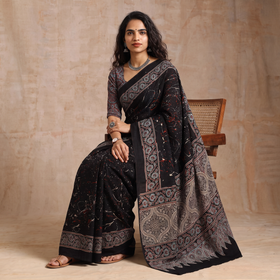 Black Natural Dyed Block Print Silk Ajrakh Saree, draped and worn by a woman, AI visual of the saree, iTokri