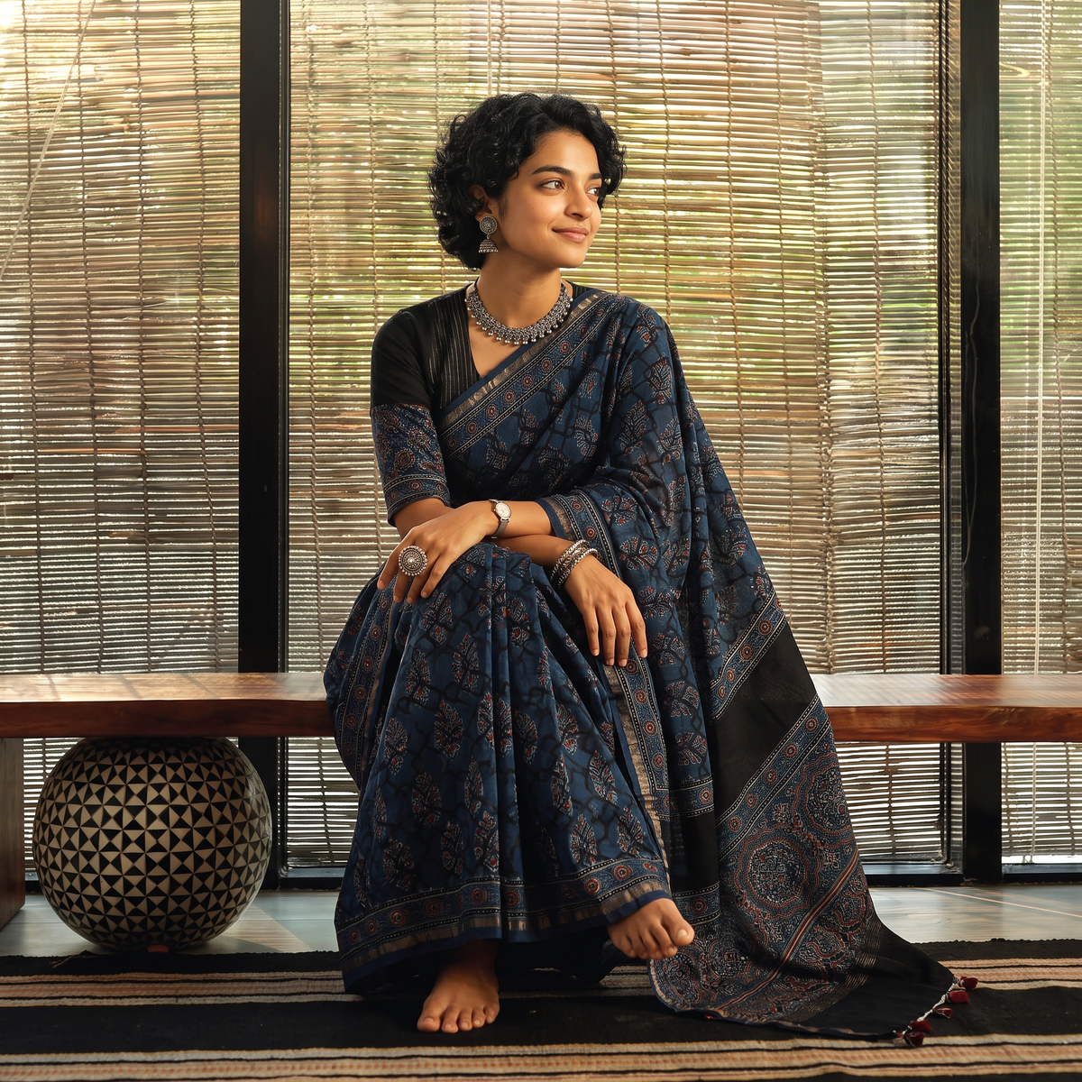 Blue Natural Dyed Hand Block Print Chanderi Silk Ajrakh Saree with Tassels, draped and worn by a woman, AI visual of the saree, iTokri