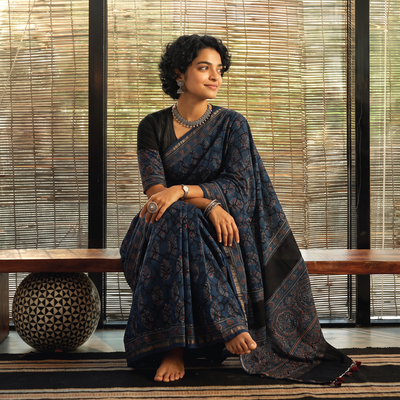 Blue Natural Dyed Hand Block Print Chanderi Silk Ajrakh Saree with Tassels, draped and worn by a woman, AI visual of the saree, iTokri