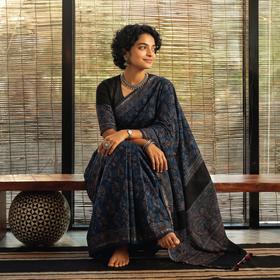 Blue Natural Dyed Hand Block Print Chanderi Silk Ajrakh Saree with Tassels, draped and worn by a woman, AI visual of the saree, iTokri