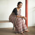 Beige Natural Dyed Kota Doria Cotton Hand Block Bagh Print Saree, draped and worn by a woman, AI visual of the saree, iTokri