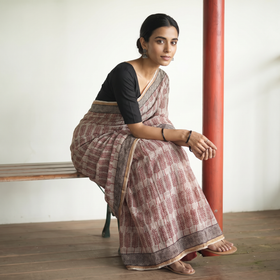 Beige Natural Dyed Kota Doria Cotton Hand Block Bagh Print Saree, draped and worn by a woman, AI visual of the saree, iTokri