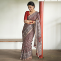 Beige Natural Dyed Kota Doria Cotton Hand Block Bagh Print Saree, draped and worn by a woman, AI visual of the saree, iTokri