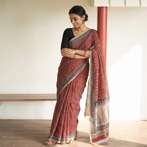 Red Natural Dyed Kota Doria Cotton Hand Block Bagh Print Saree, draped and worn by a woman, AI visual of the saree, iTokri