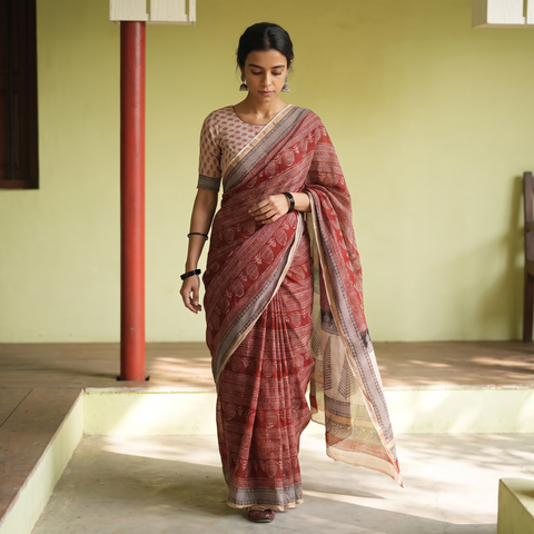 Red Natural Dyed Kota Doria Cotton Hand Block Bagh Print Saree, draped and worn by a woman, AI visual of the saree, iTokri