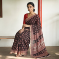 Black Natural Dyed Kota Doria Cotton Hand Block Bagh Print Saree, draped and worn by a woman, AI visual of the saree, iTokri