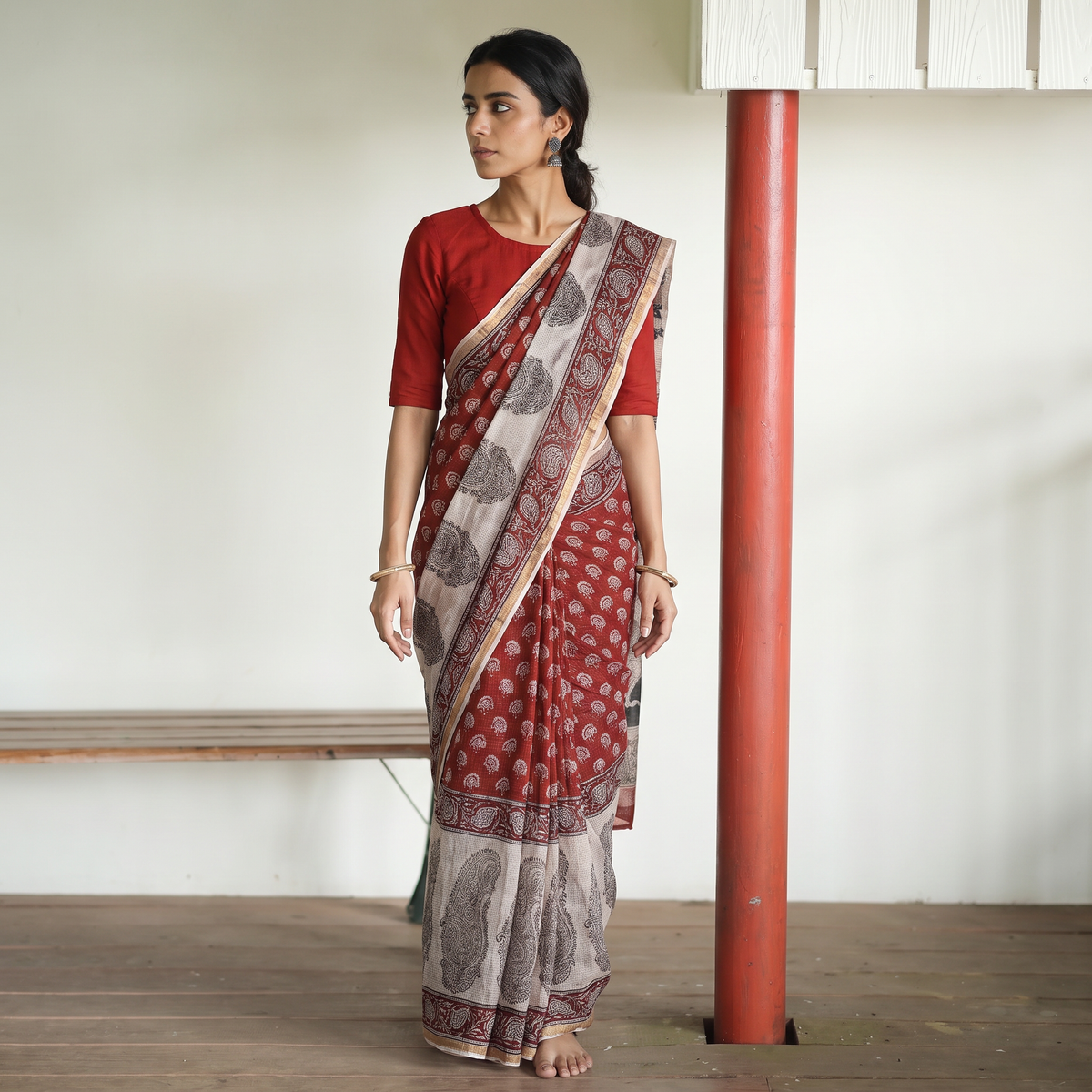 Red Natural Dyed Kota Doria Cotton Hand Block Bagh Print Saree, draped and worn by a woman, AI visual of the saree, iTokri