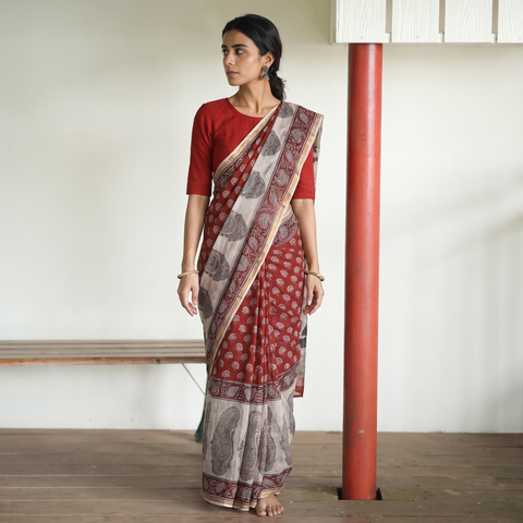 Red Natural Dyed Kota Doria Cotton Hand Block Bagh Print Saree, draped and worn by a woman, AI visual of the saree, iTokri