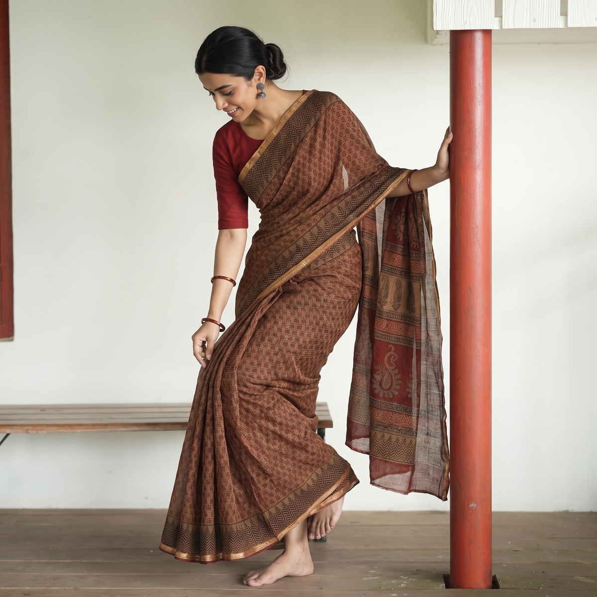 Brown Natural Dyed Kota Doria Cotton Hand Block Bagh Print Saree, draped and worn by a woman, AI visual of the saree, iTokri