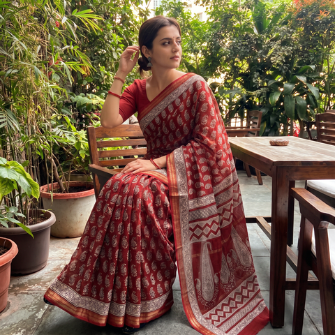 Red Natural Dyed Maheshwari Silk Bagh Print Saree, draped and worn by a woman, AI visual of the saree, iTokri
