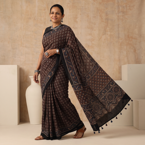 Brown Natural Dyed Modal Silk Kutch Hand Block Print Ajrakh Saree, draped and worn by a woman, AI visual of the saree, iTokri