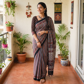 Multicolor Natural Dyed Modal Silk Kutch Hand Block Print Ajrakh Saree, draped and worn by a woman, AI visual of the saree, iTokri