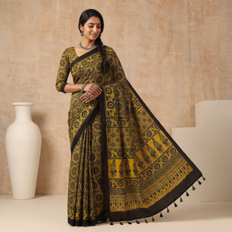 Yellow Natural Dyed Modal Silk Kutch Hand Block Print Ajrakh Saree, draped and worn by a woman, AI visual of the saree, iTokri