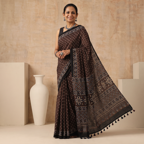 Brown Natural Dyed Modal Silk Kutch Hand Block Print Ajrakh Saree, draped and worn by a woman, AI visual of the saree, iTokri