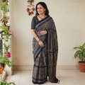 Black Natural Dyed Modal Silk Kutch Hand Block Print Ajrakh Saree, draped and worn by a woman, AI visual of the saree, iTokri