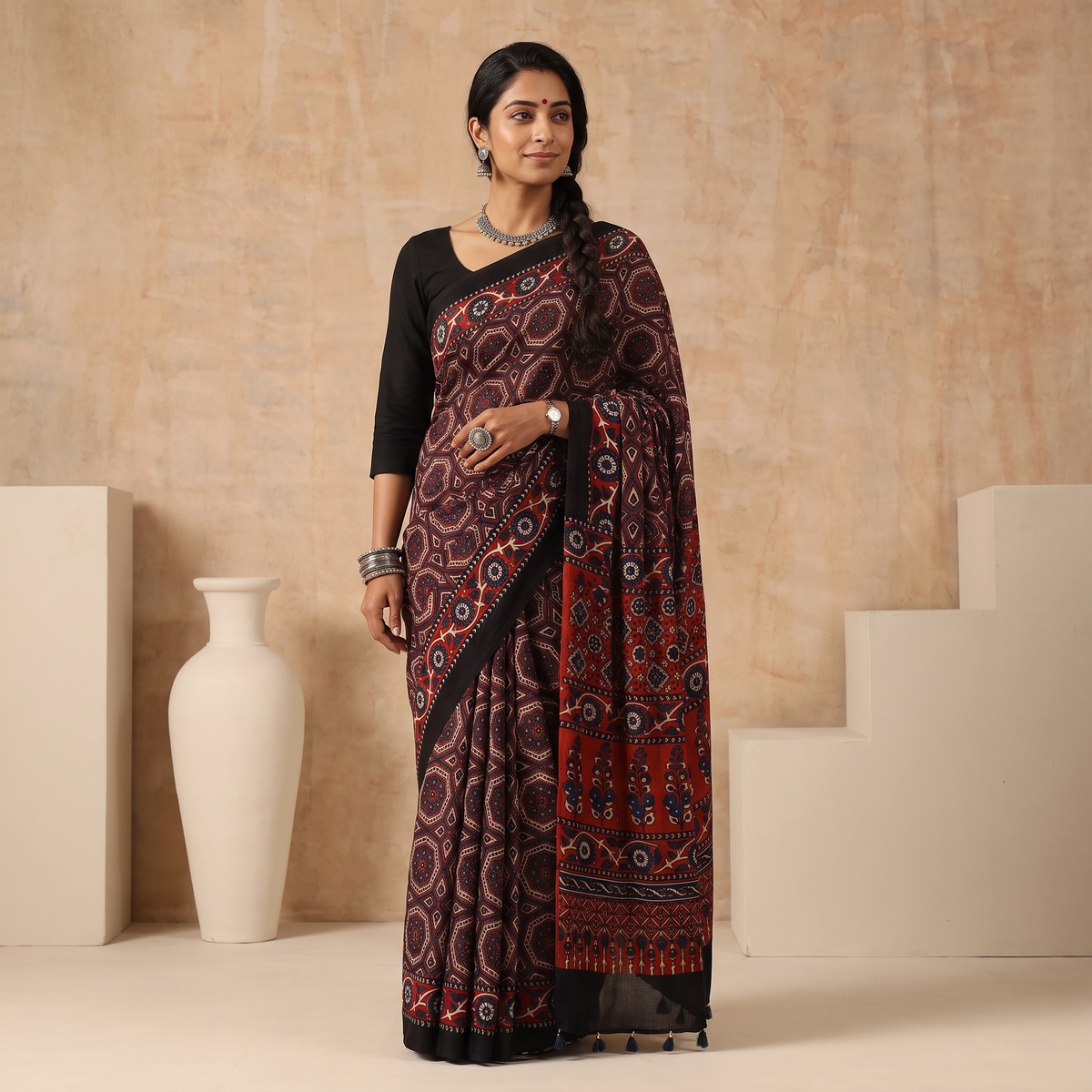 Red Natural Dyed Modal Silk Kutch Hand Block Print Ajrakh Saree, draped and worn by a woman, AI visual of the saree, iTokri