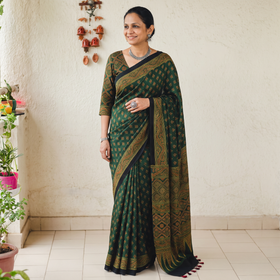 Green Natural Dyed Modal Silk Kutch Hand Block Print Ajrakh Saree, draped and worn by a woman, AI visual of the saree, iTokri