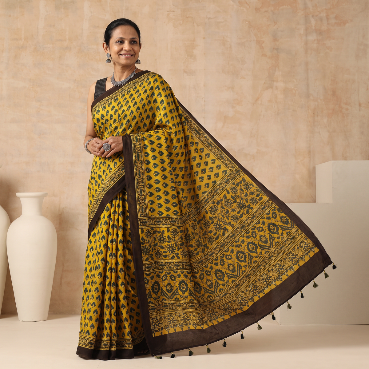 Yellow Natural Dyed Modal Silk Kutch Hand Block Print Ajrakh Saree, draped and worn by a woman, AI visual of the saree, iTokri