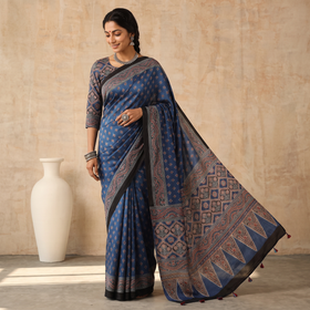 Blue Natural Dyed Modal Silk Kutch Hand Block Print Ajrakh Saree, draped and worn by a woman, AI visual of the saree, iTokri