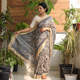 Black Natural Dyed Pedana Block Print Chanderi Silk Kalamkari Saree, draped and worn by a woman, AI visual of the saree, iTokri