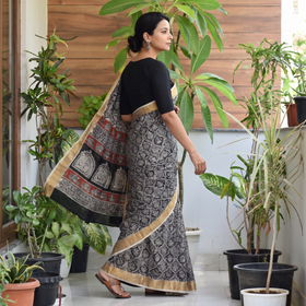 Black Natural Dyed Pedana Block Print Chanderi Silk Kalamkari Saree, draped and worn by a woman, AI visual of the saree, iTokri