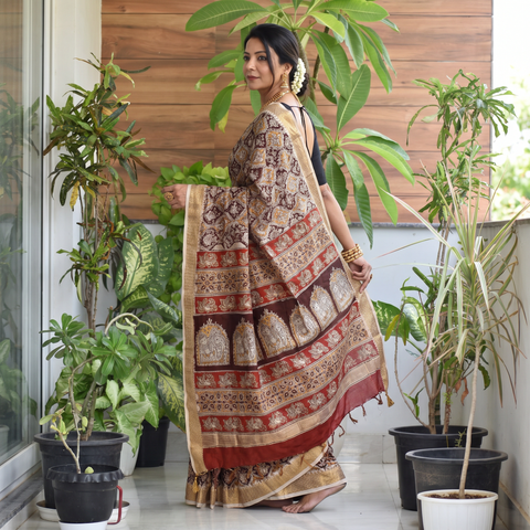 Brown Natural Dyed Pedana Block Print Chanderi Silk Kalamkari Saree, draped and worn by a woman, AI visual of the saree, iTokri