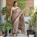 Brown Natural Dyed Pedana Block Print Chanderi Silk Kalamkari Saree, draped and worn by a woman, AI visual of the saree, iTokri