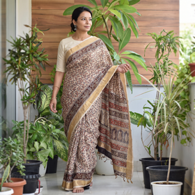 Brown Natural Dyed Pedana Block Print Chanderi Silk Kalamkari Saree, draped and worn by a woman, AI visual of the saree, iTokri