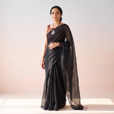Black Nazaakat Kota Doria Cotton Plain Saree with Blouse & Jewellery Set, draped and worn by a woman, AI visual of the saree, iTokri